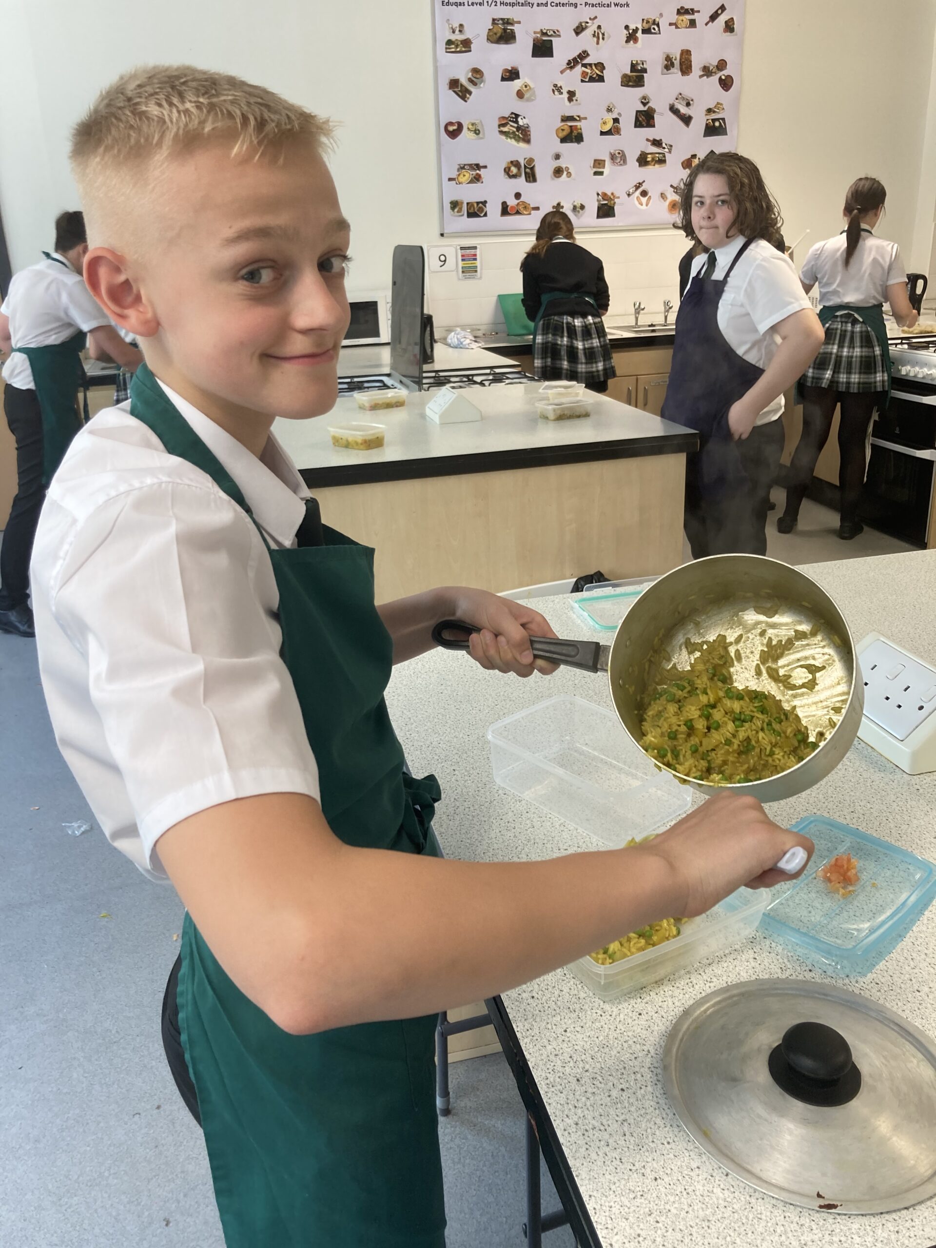 Y8 cooking their savoury rice dish in Food Tech