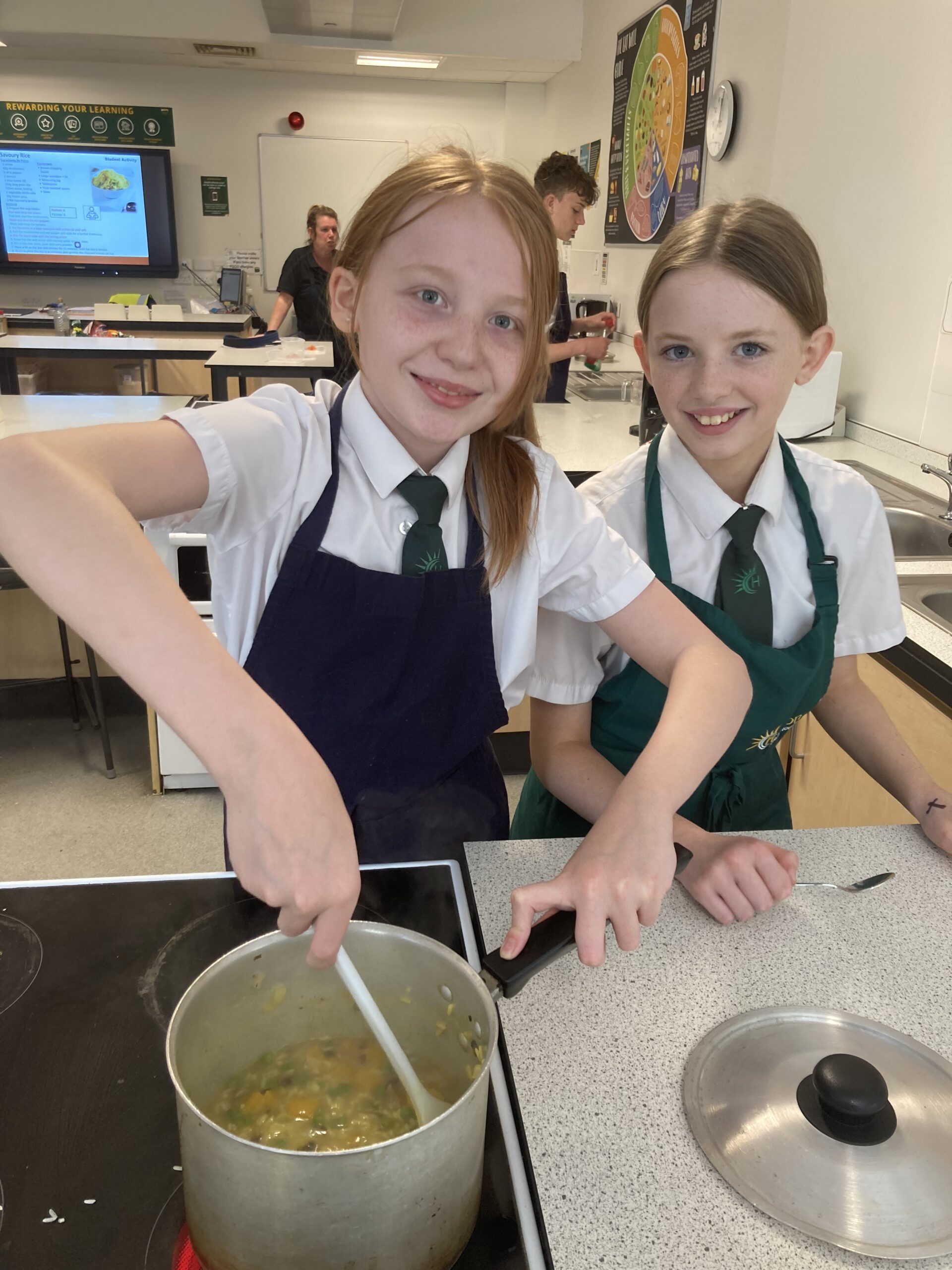 Y8 cooking their savoury rice dish in Food Tech