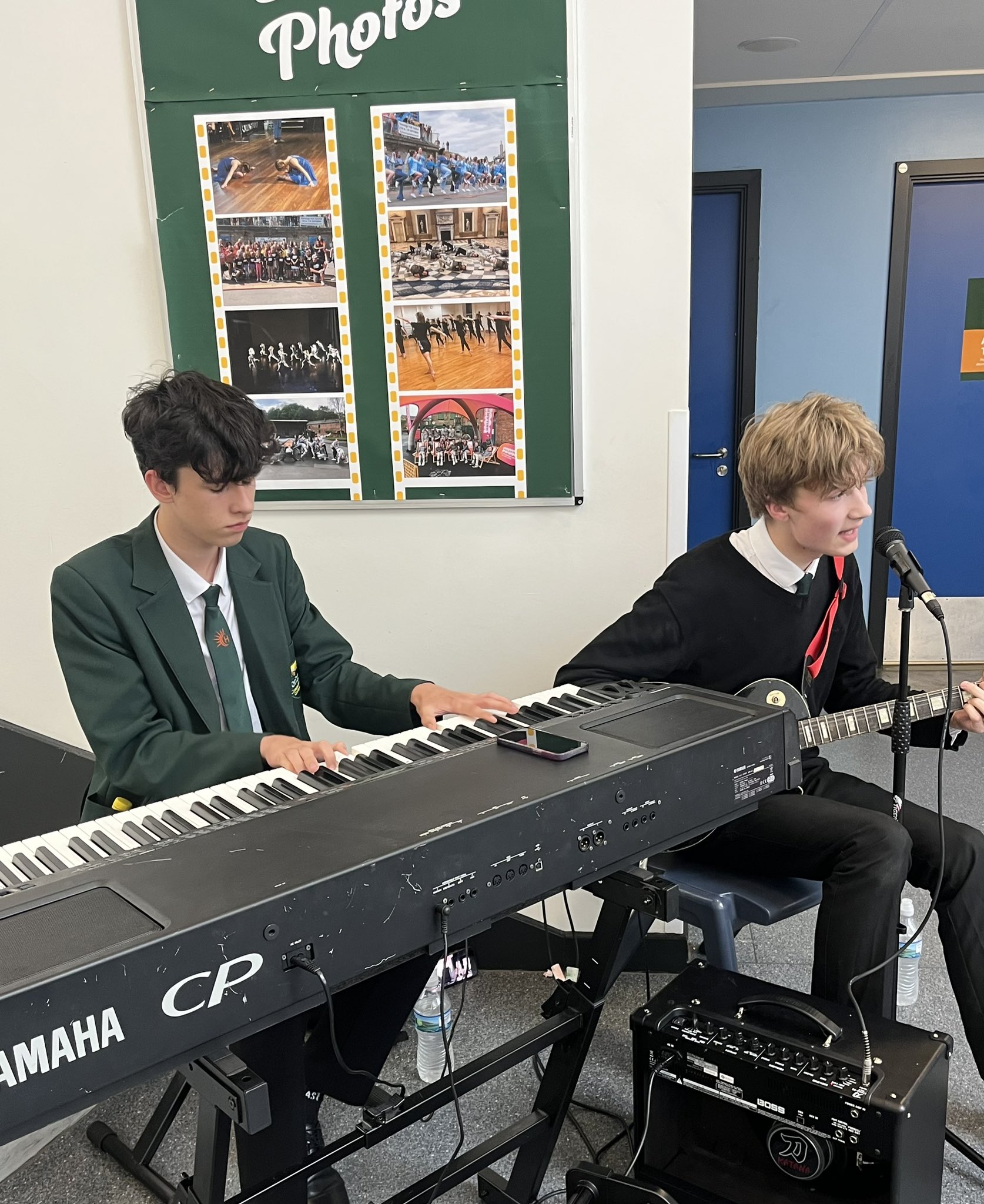 26. Elliot and Liam playing as guests arrive for the Sports Awards
