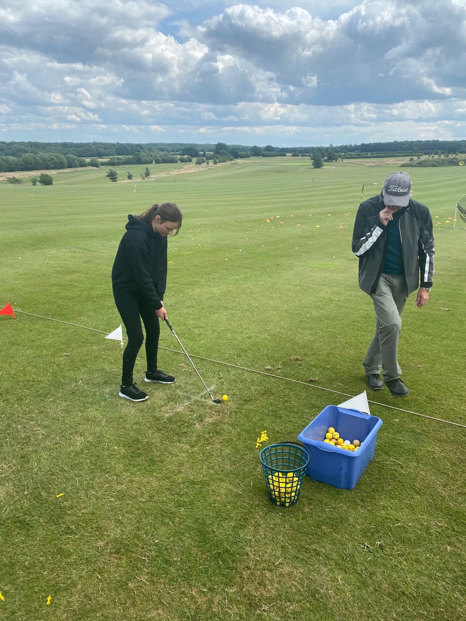 40. Students trying golf at Woolley driving range